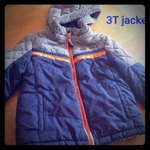 Size 3t winter jacket with hood . Fur lined inside